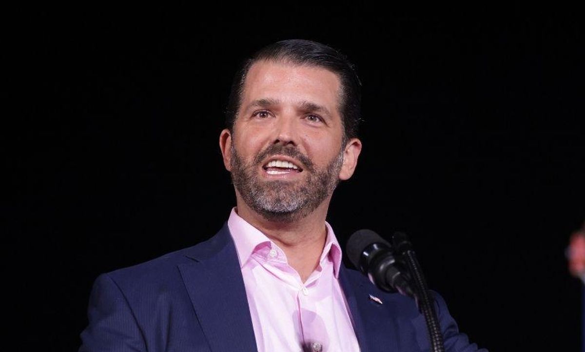 Don Jr. Seen Holding Dr. Seuss Book Super Awkwardly in Viral Photo—and People Think They Know Why