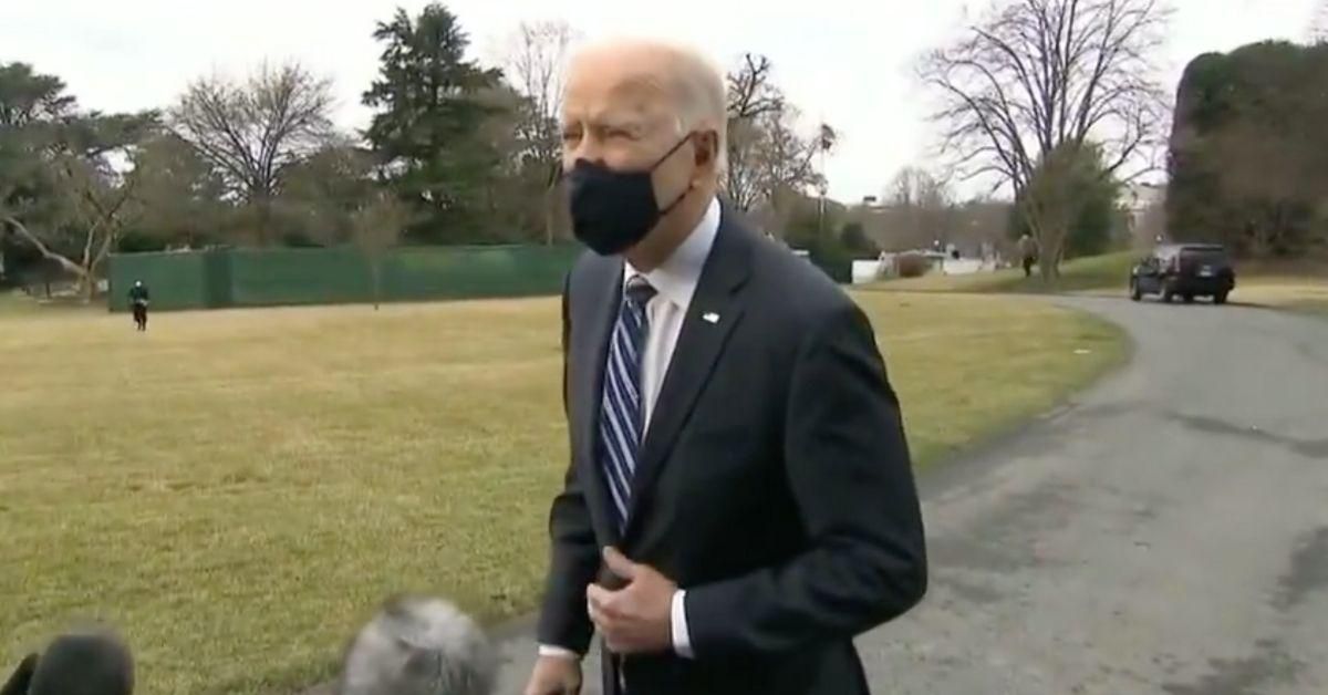 Conspiracy Theorists Lose Their Minds After Biden's Hand 'Floats Through' Reporter's Boom Mic