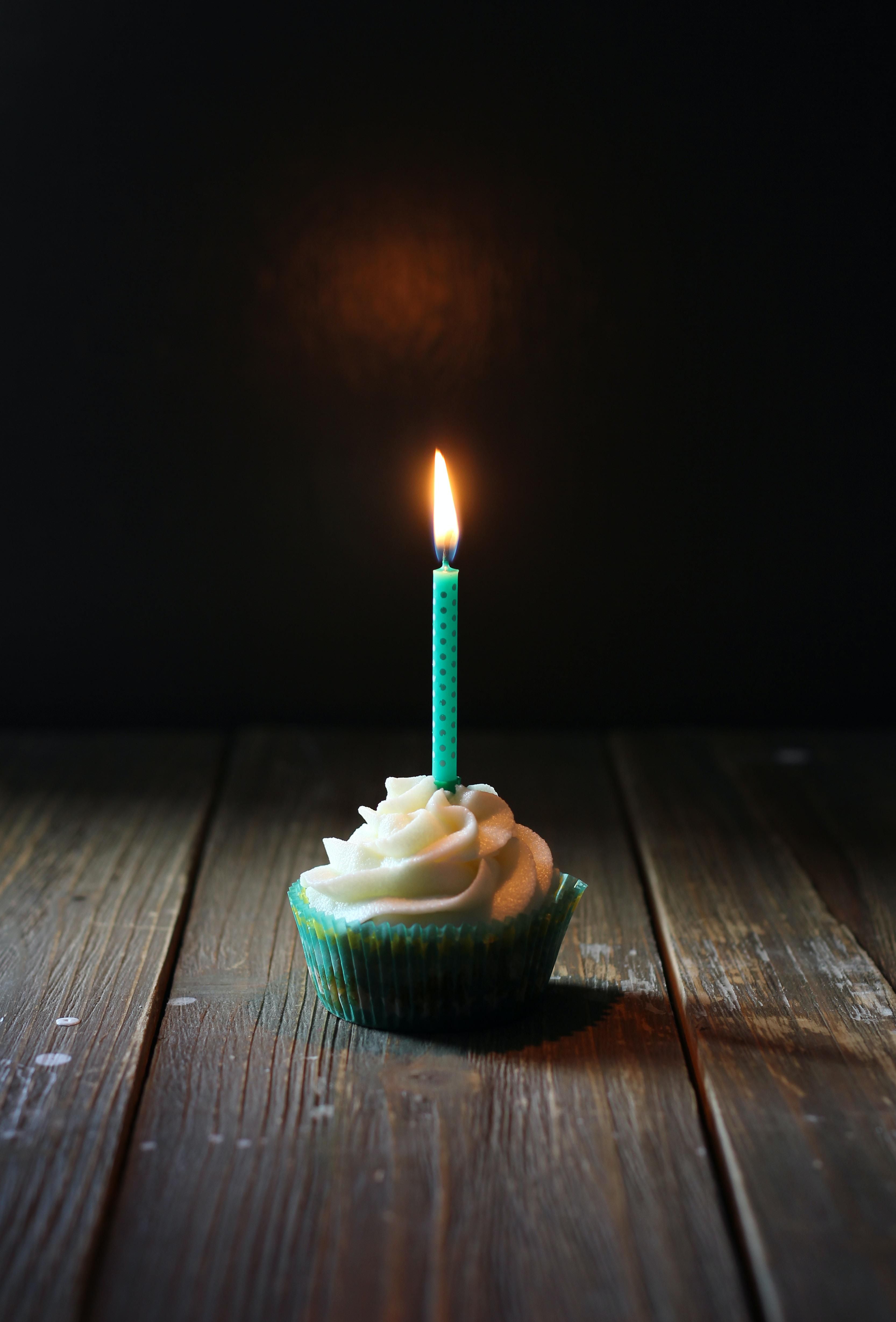 one candle on cupcake