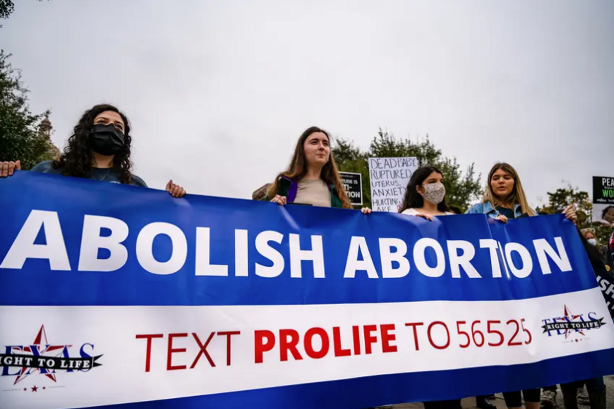 Gov. Greg Abbott signs into law one of nation’s strictest abortion measures, banning procedure as early as six weeks into a pregnancy
