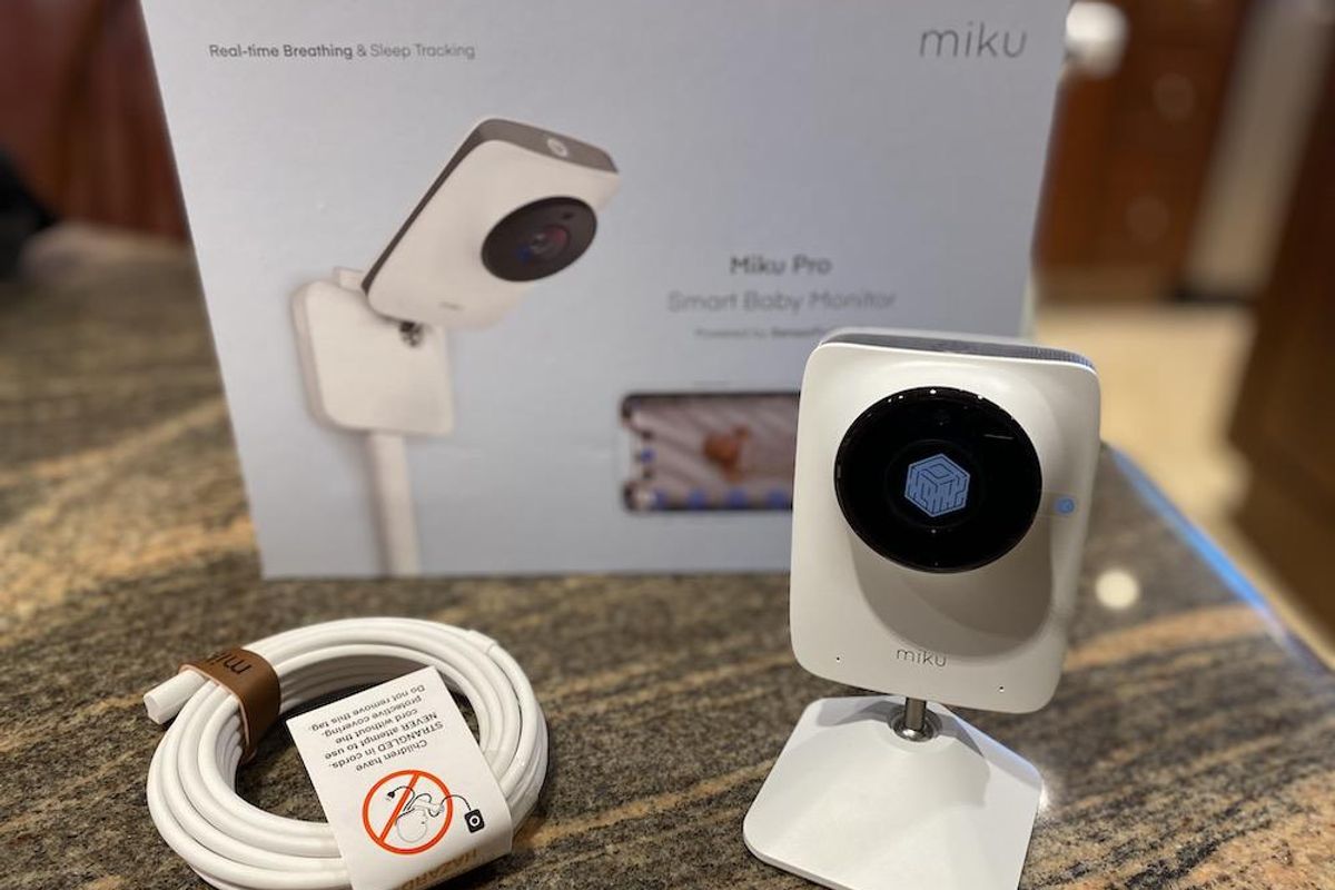 Miku Pro Smart Baby Monitor on a countertop, unboxed