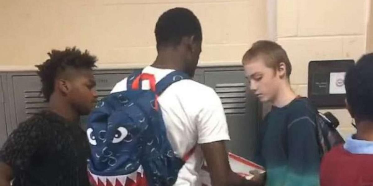 High schooler mocked for wearing the same clothes every day surprised by football players