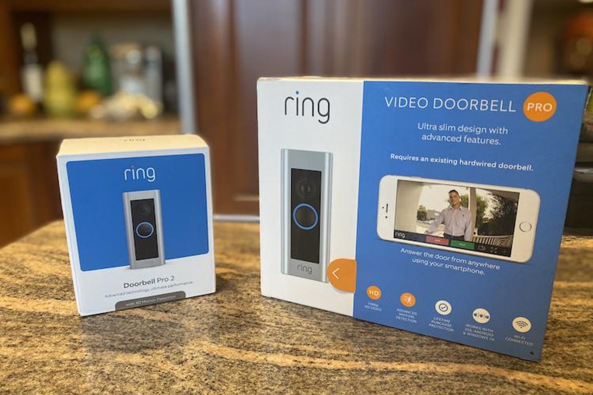Ring Video Doorbell Pro 2 and Pro boxed on a countertop