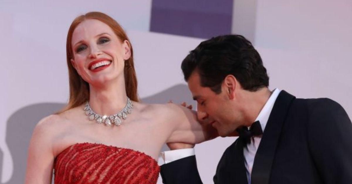 Jessica Chastain Coyly Responds To Speculating Fans After Oscar Isaac Kisses Her Arm On Red Carpet