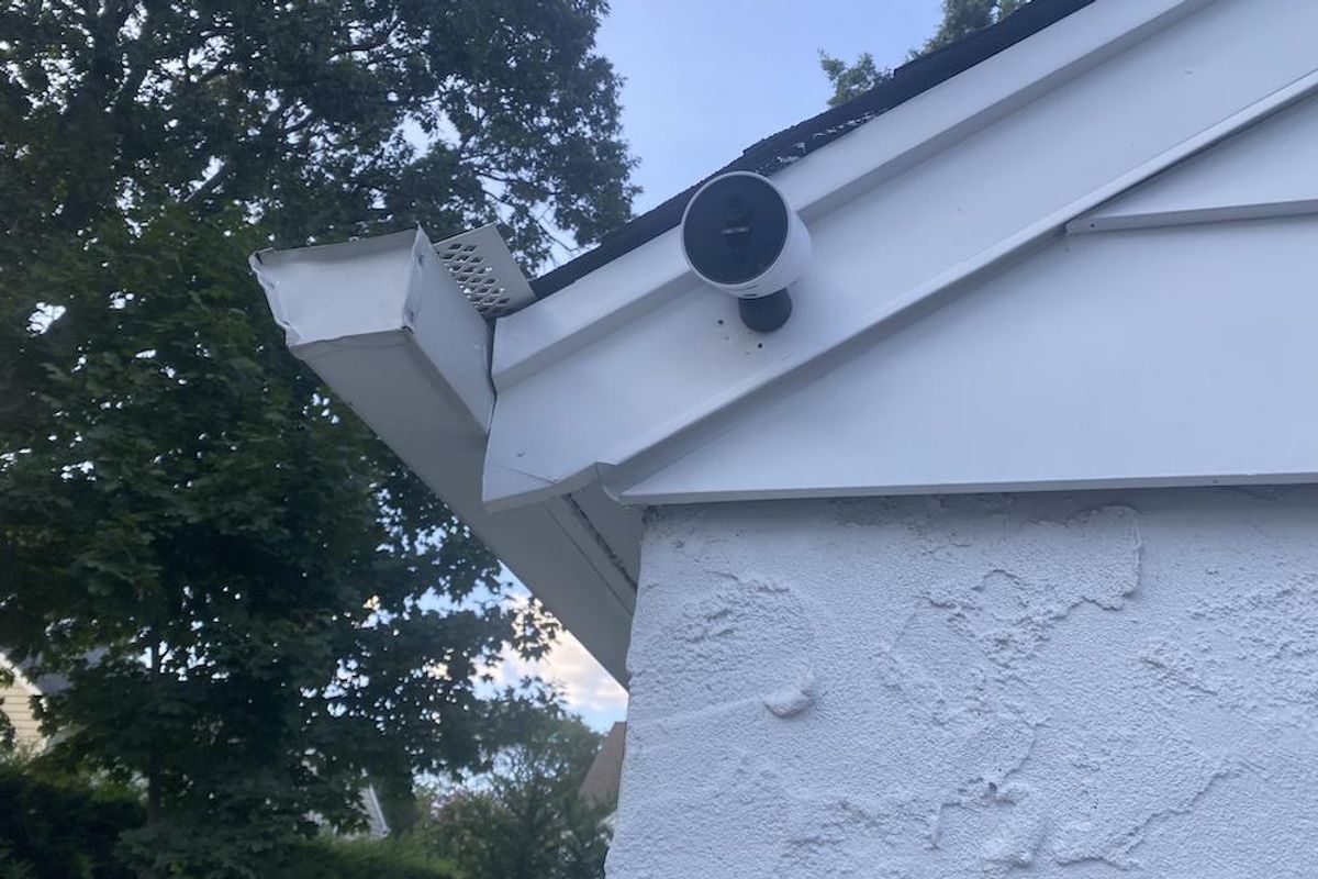 SimpliSafe Outdoor Camera installed on a garage