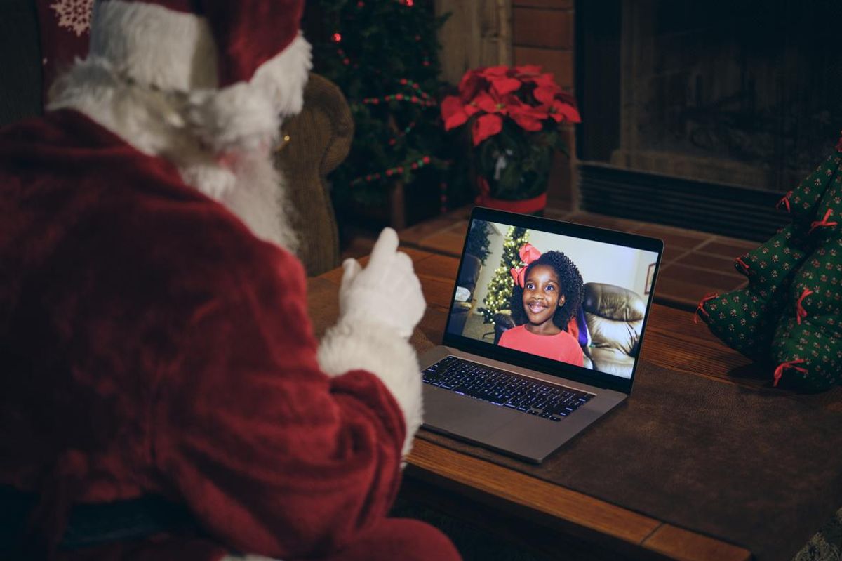 Santa video chatting with a student