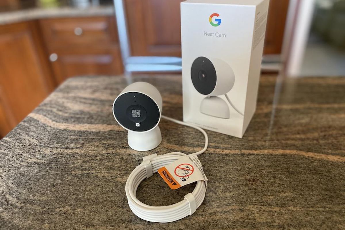 Google Nest Cam 2nd Generation Indoor Wired Security Camera and box on a countertop