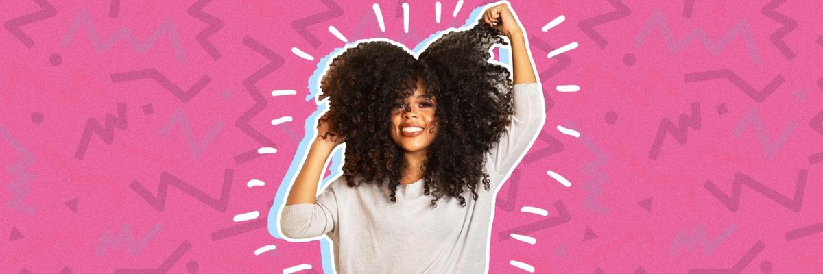 Curly haired girl smiling