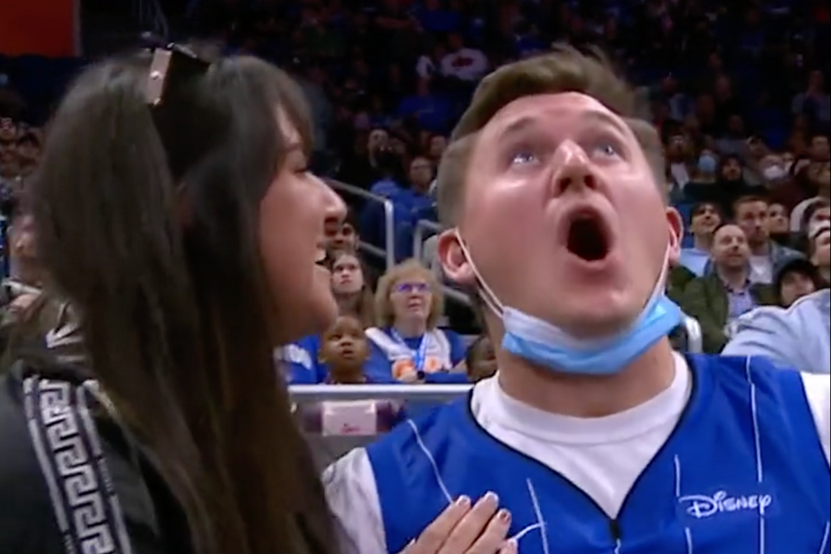 guy finds out he's going to be a dad on kiss cam