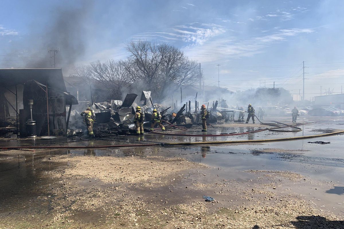 Car lot, two cars in South Austin catch fire