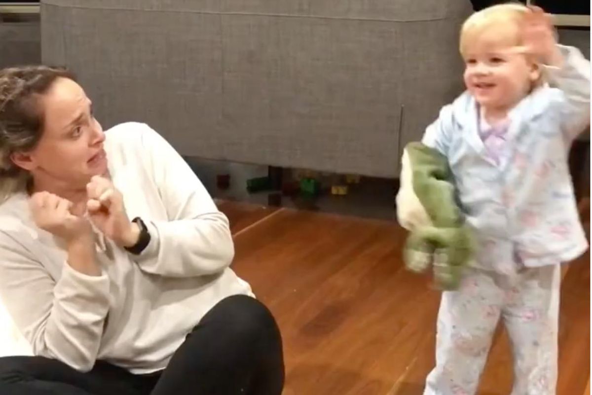 Hilariously sweet toddler comforts mom after scaring her with a puppet