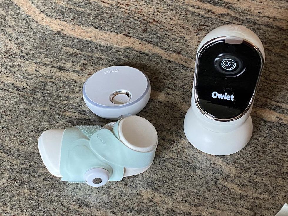Photo of Owlet Dream Duo and Sock on a countertop