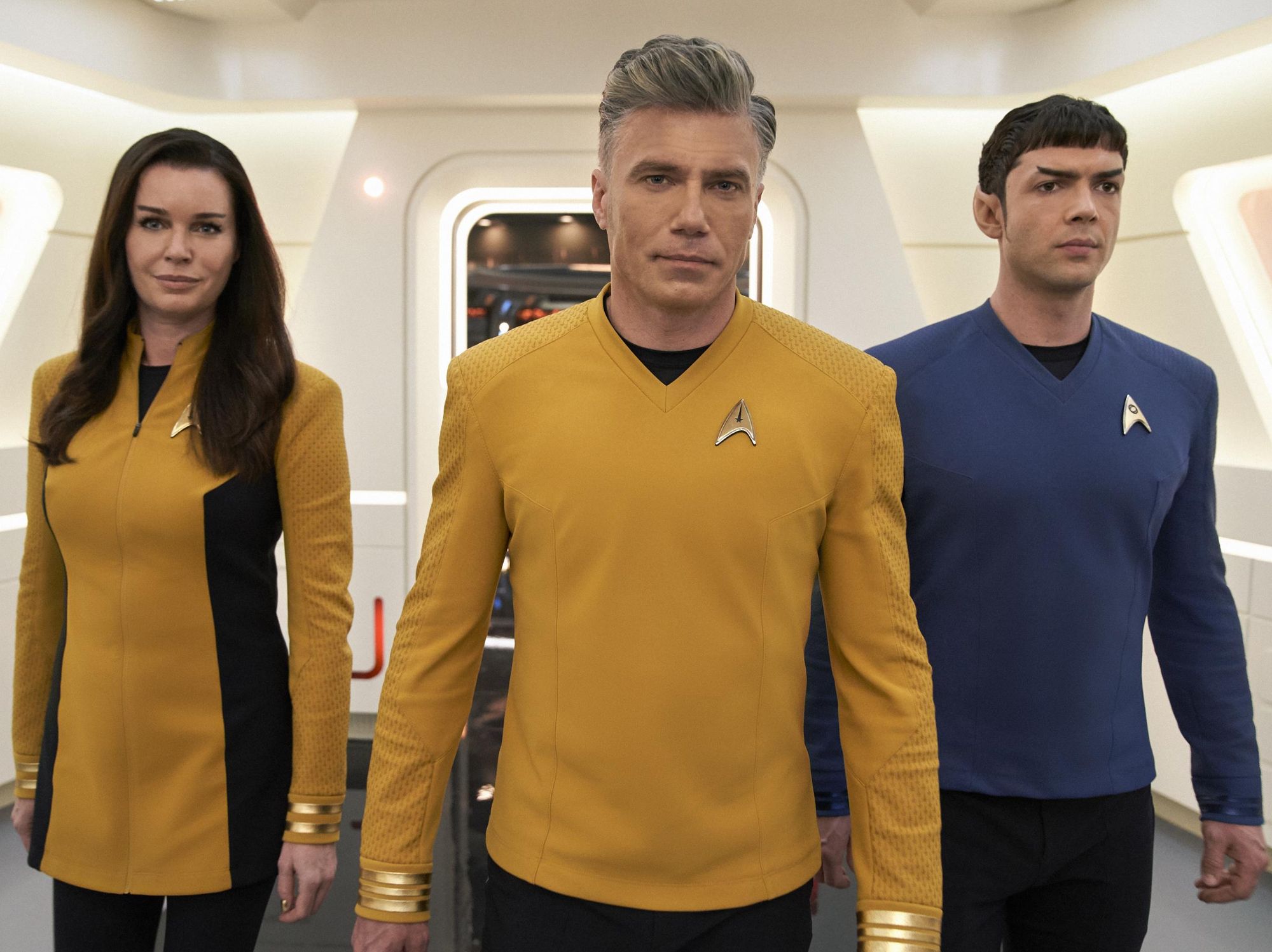 ​Rebecca Romijn as Una with Anson Mount as Pike and Ethan Peck as Spock