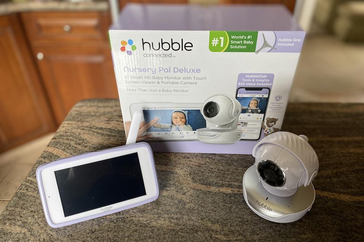 Hubble Connected Nursery Pal Deluxe box, interactive display and camera on a countertop