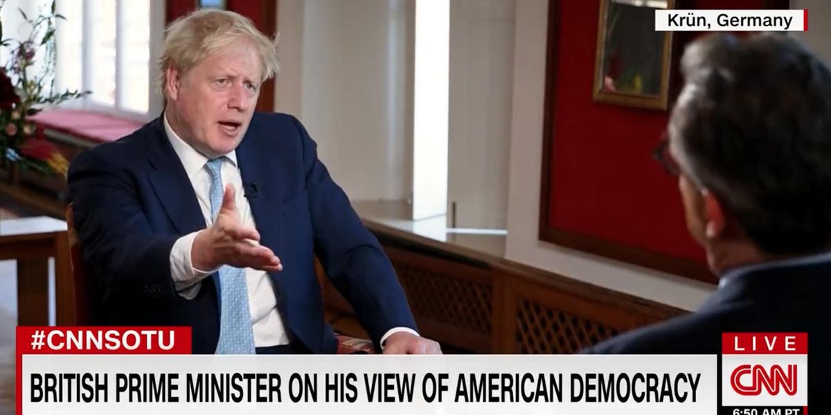 CNN tries to get Boris Johnson to bash the US — but he refuses to take the bait: 'A shining city on a hill'