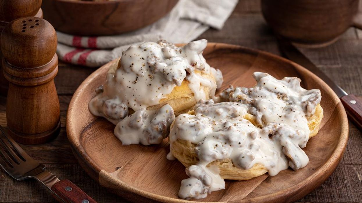 Sausage gravy on top of two biscuits.