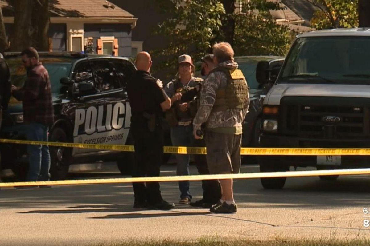 Woman wearing padlocked dog collar pleads for neighbor's help, claims she was held captive in man's home. Suspect arrested, charged with kidnapping and rape.
