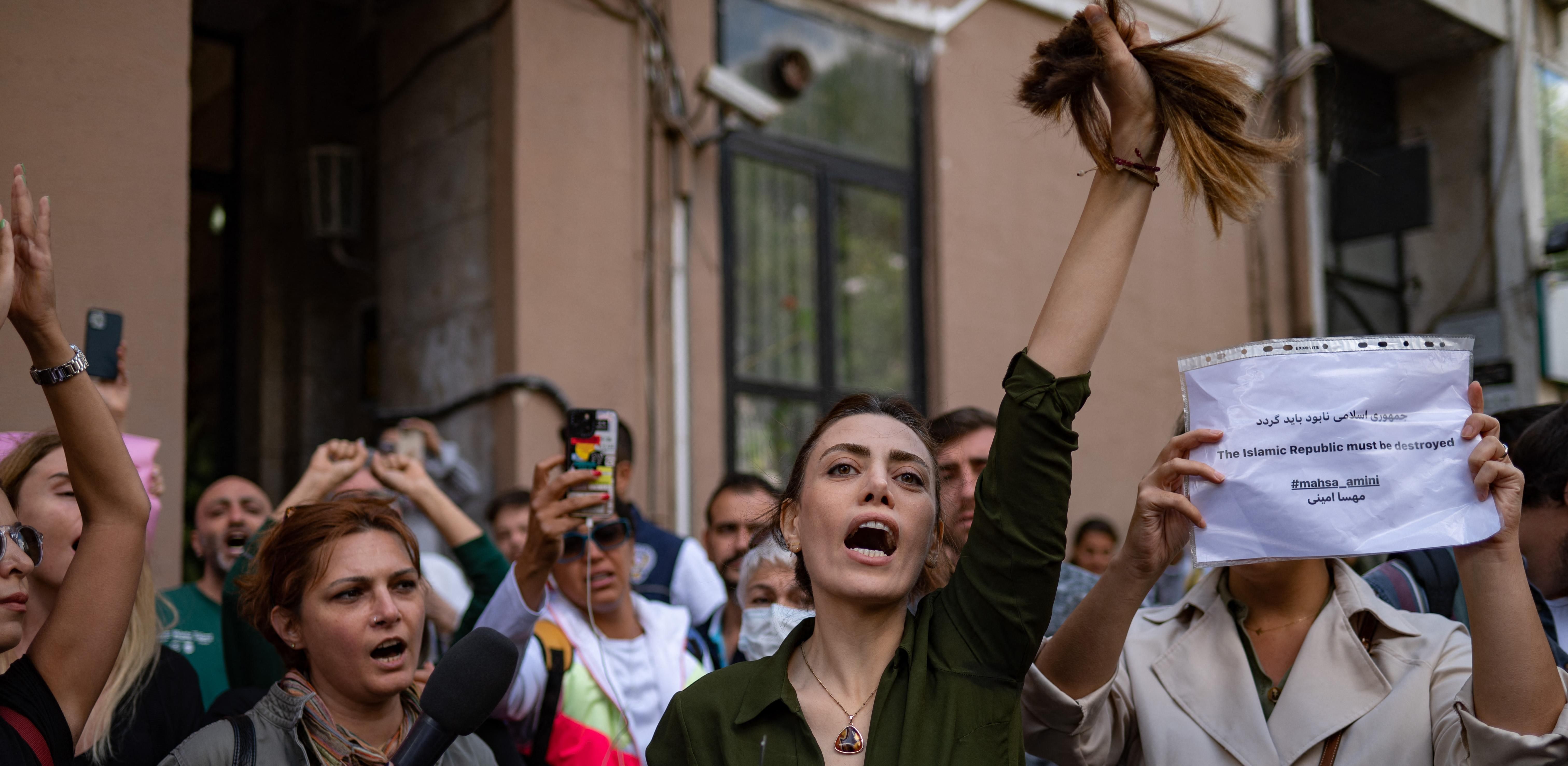 Iran: Women Cut Hair, Burn Hijabs to Protest Mahsa Amini's Death - PAPER