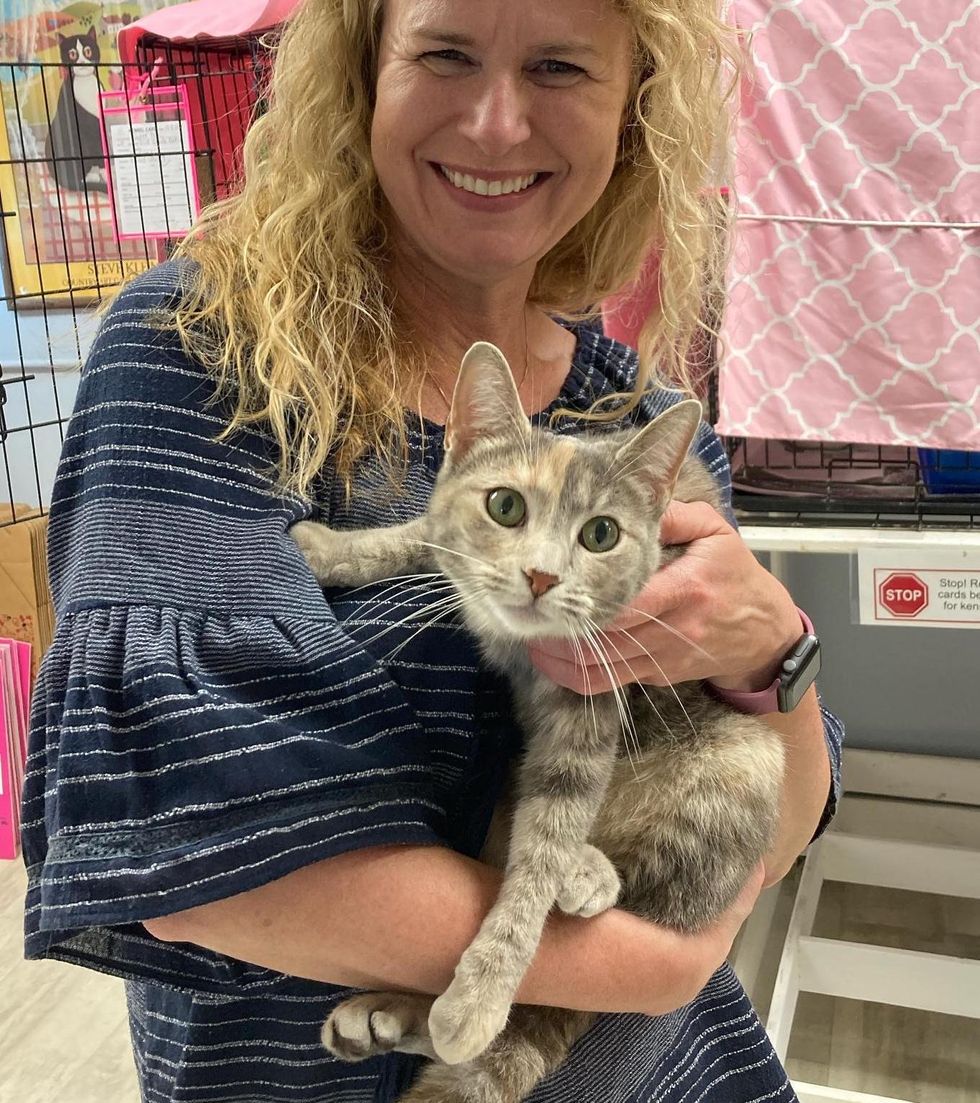 cat hugs rescuer