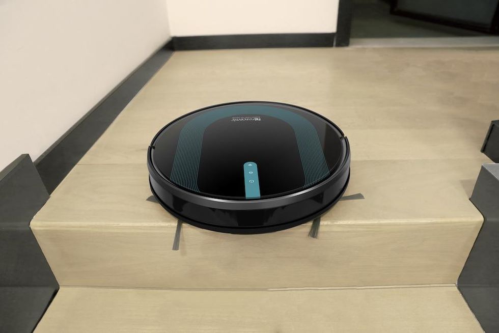 photo of Proscenic 850T Robot Vacuum Cleaner at the top of the stairs