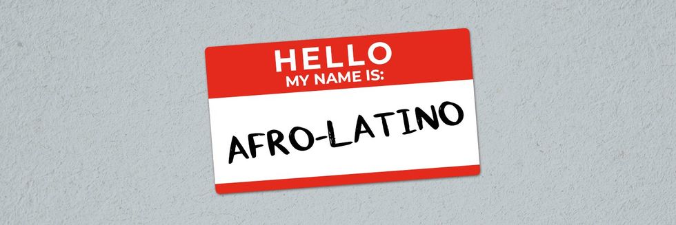 a nametag that says Afro Latino