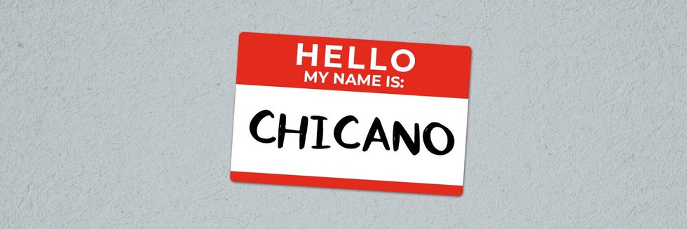 a nametag that says Chicano