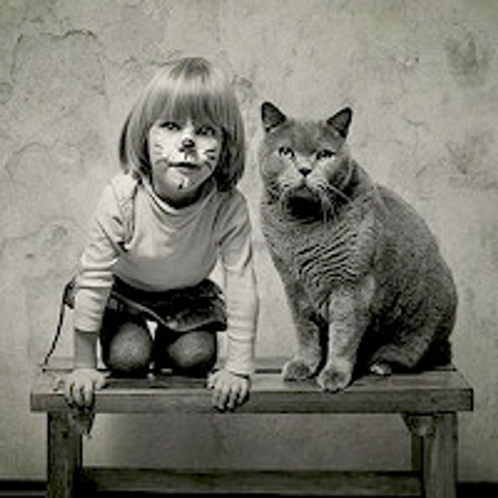 Beautiful Friendship Between a Girl and Her Cat
