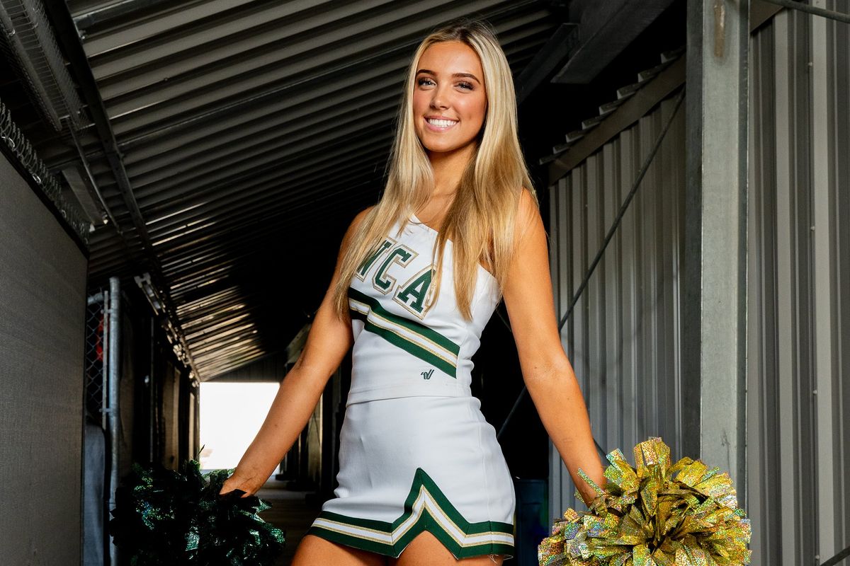 SHINING BRIGHT: Armstrong-Behe stars on court; cheer team