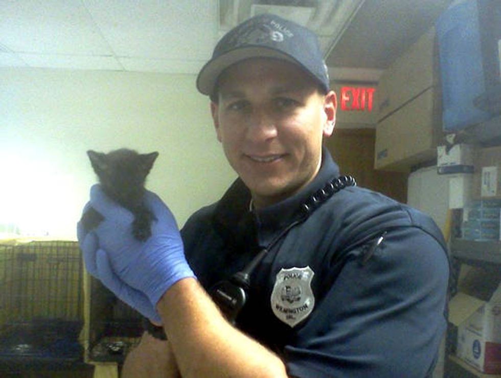 Police Officer Saves Tiny Kitten From Abandoned Home