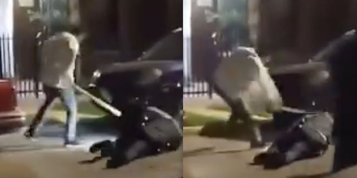NextImg:Chicago cop bashed in back of head with wooden flagpole as he lies face-down in street