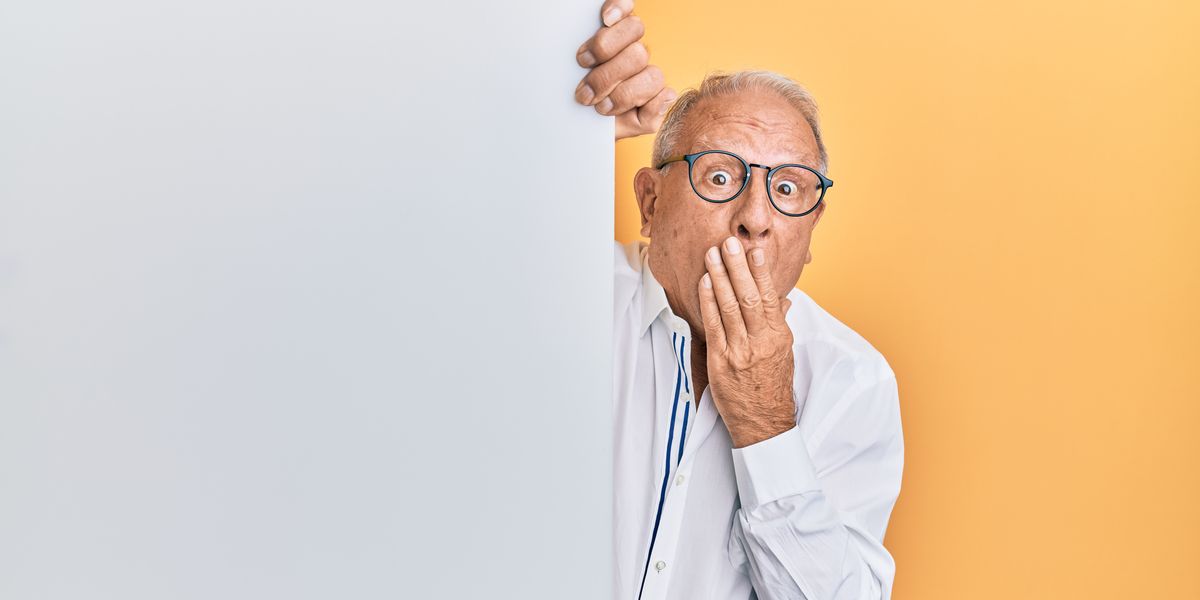 man in white dress shirt wearing black framed eyeglasses