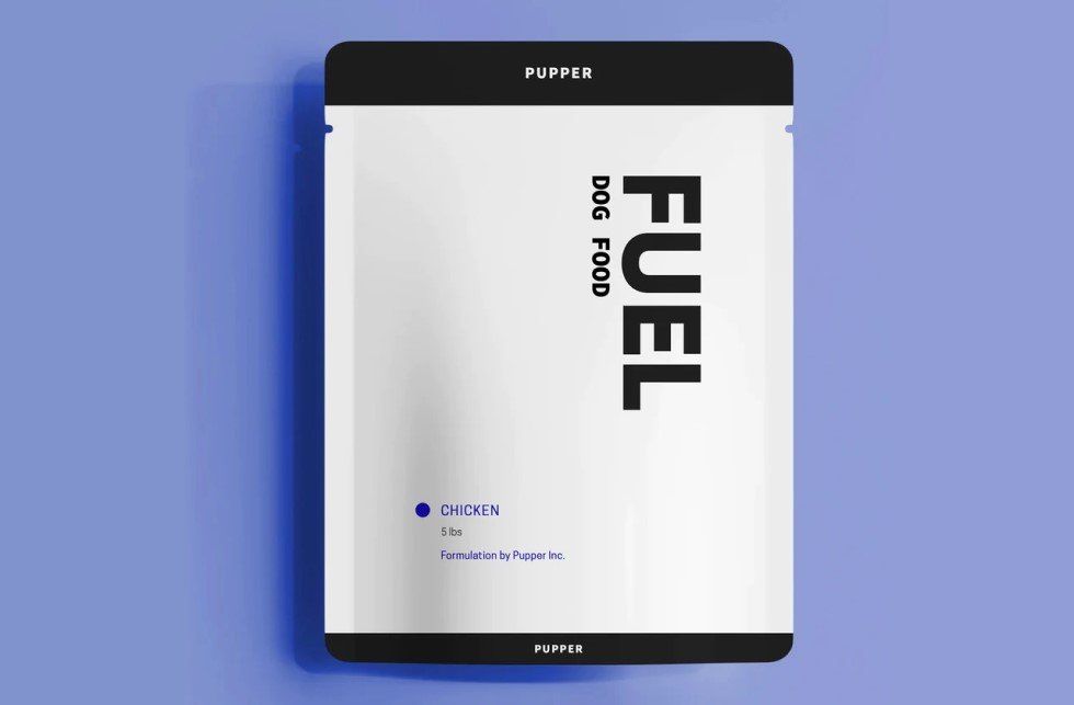 White "Pupper Fuel" dog food bag on a blue background.