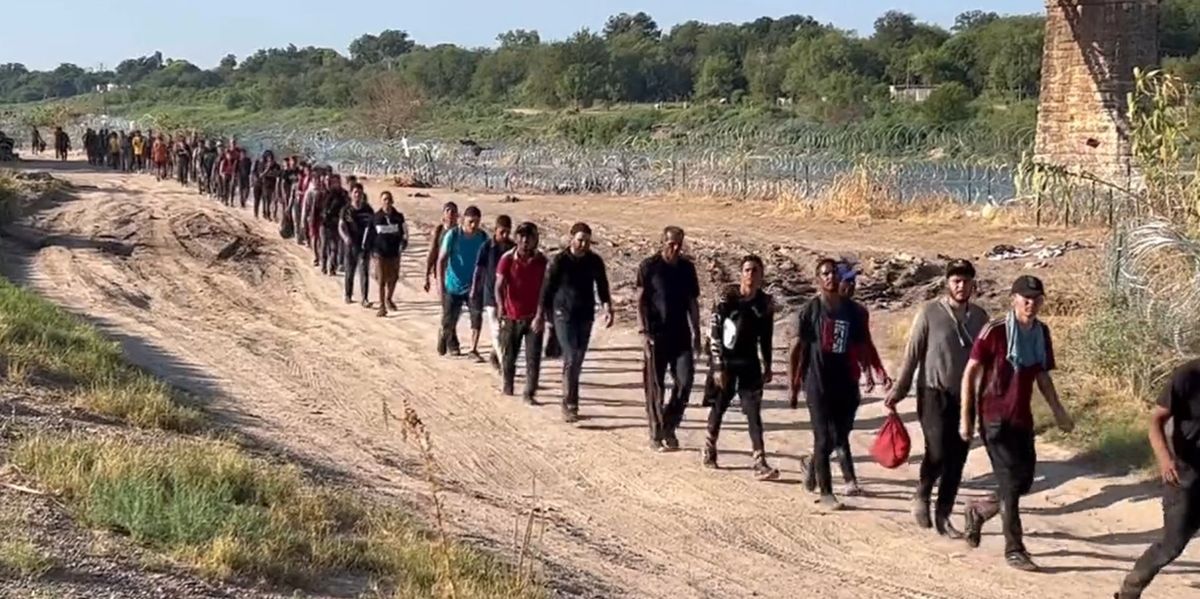 NextImg:Abbott doubles down on 'invasion' declaration and vows to reinstall defenses after Eagle Pass declares state of emergency: 'Not all of these people come in peace'