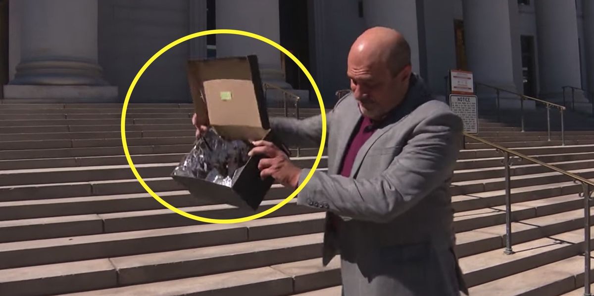 NextImg:'A present from the homeless': Denver business owner dumps human poop that he was forced to clean up on city hall steps