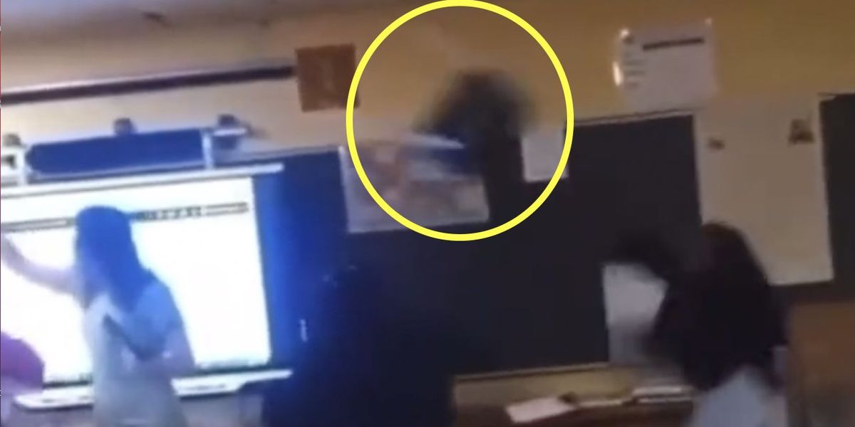 NextImg:HS student throws chair across classroom, hits teacher in head; victim hospitalized. Video purportedly of incident shows clobbered teacher knocked to floor.