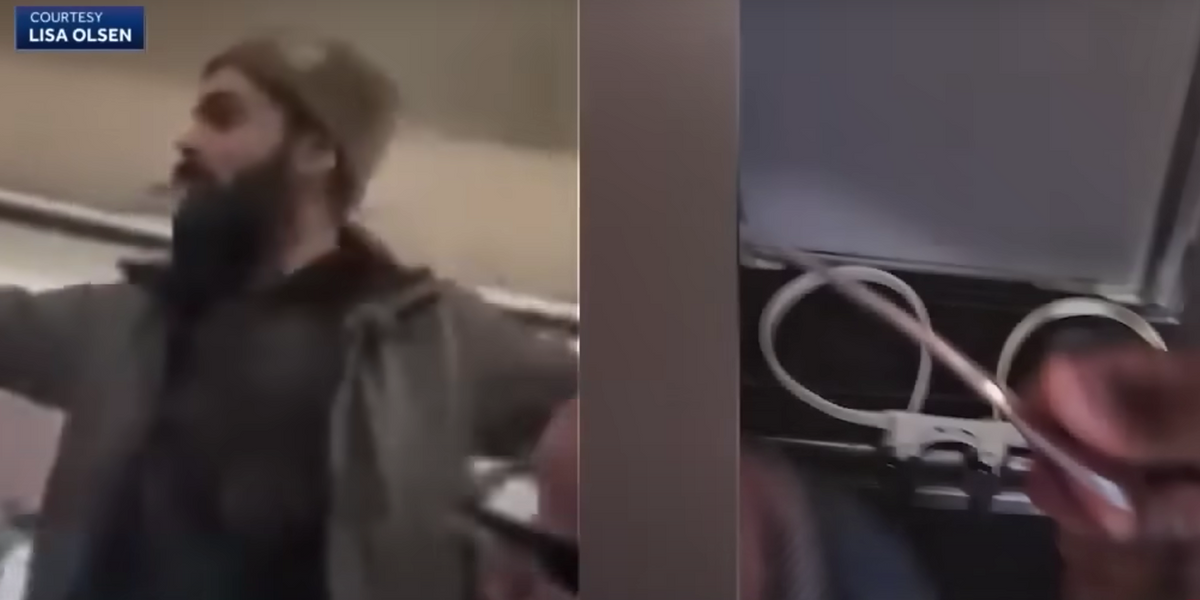 NextImg:Man faces life sentence after allegedly trying to stab flight attendant, open emergency door mid-flight