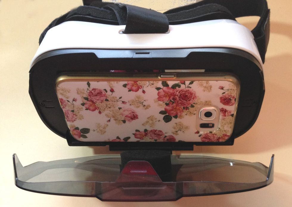 a photo of Fiit VR headset with iPhone inside