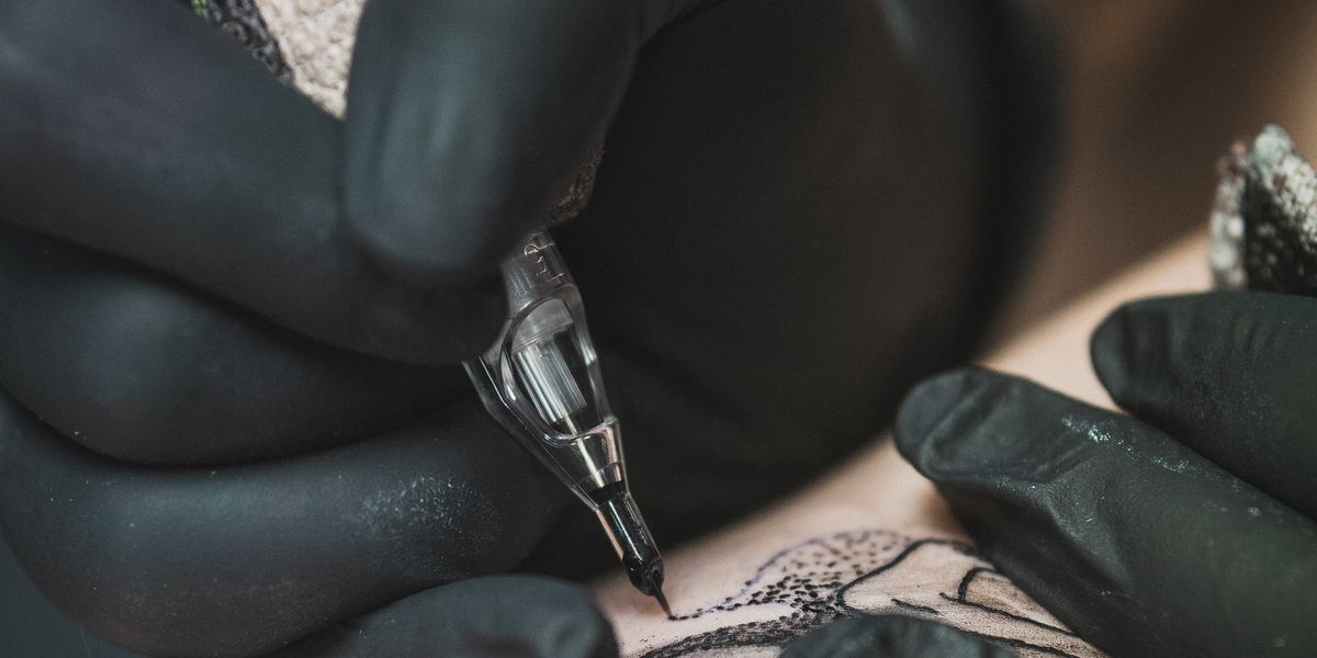 person getting a tattoo