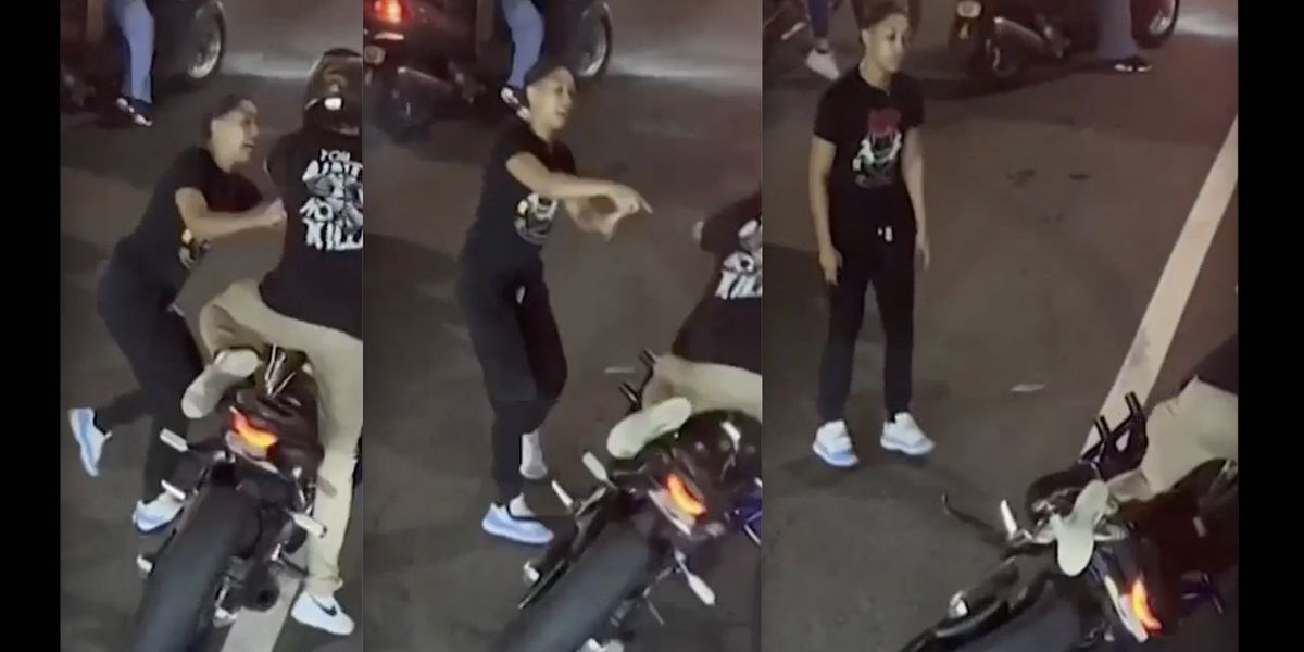 NextImg:Thug biker stomps, smashes rear window of car with kids, 2 and 5, in back seat. Mom confronts biker, who points gun at her — but she won't back down.