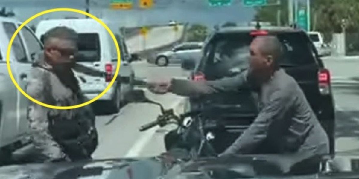 NextImg:Dashcam footage shows horrifying moment angry motorist swings machete at motorbike rider in road-rage attack