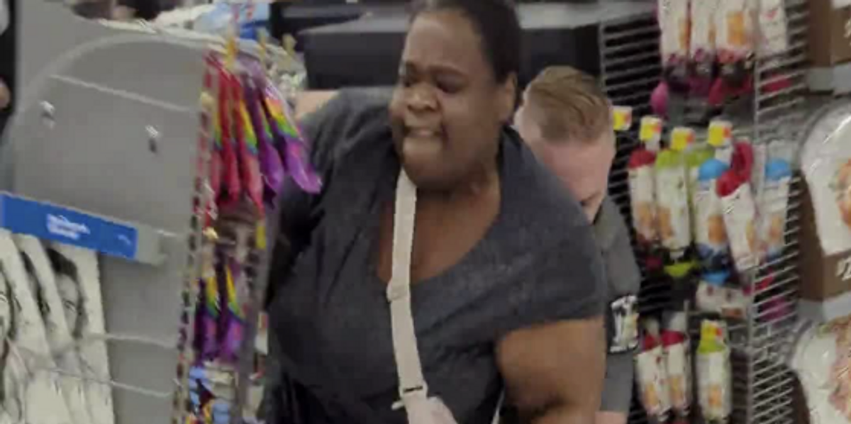 NextImg:Woman on motorized scooter suffers in-store meltdown, attacks 'white trash' state trooper, shrieks: 'Walmart is racist!'