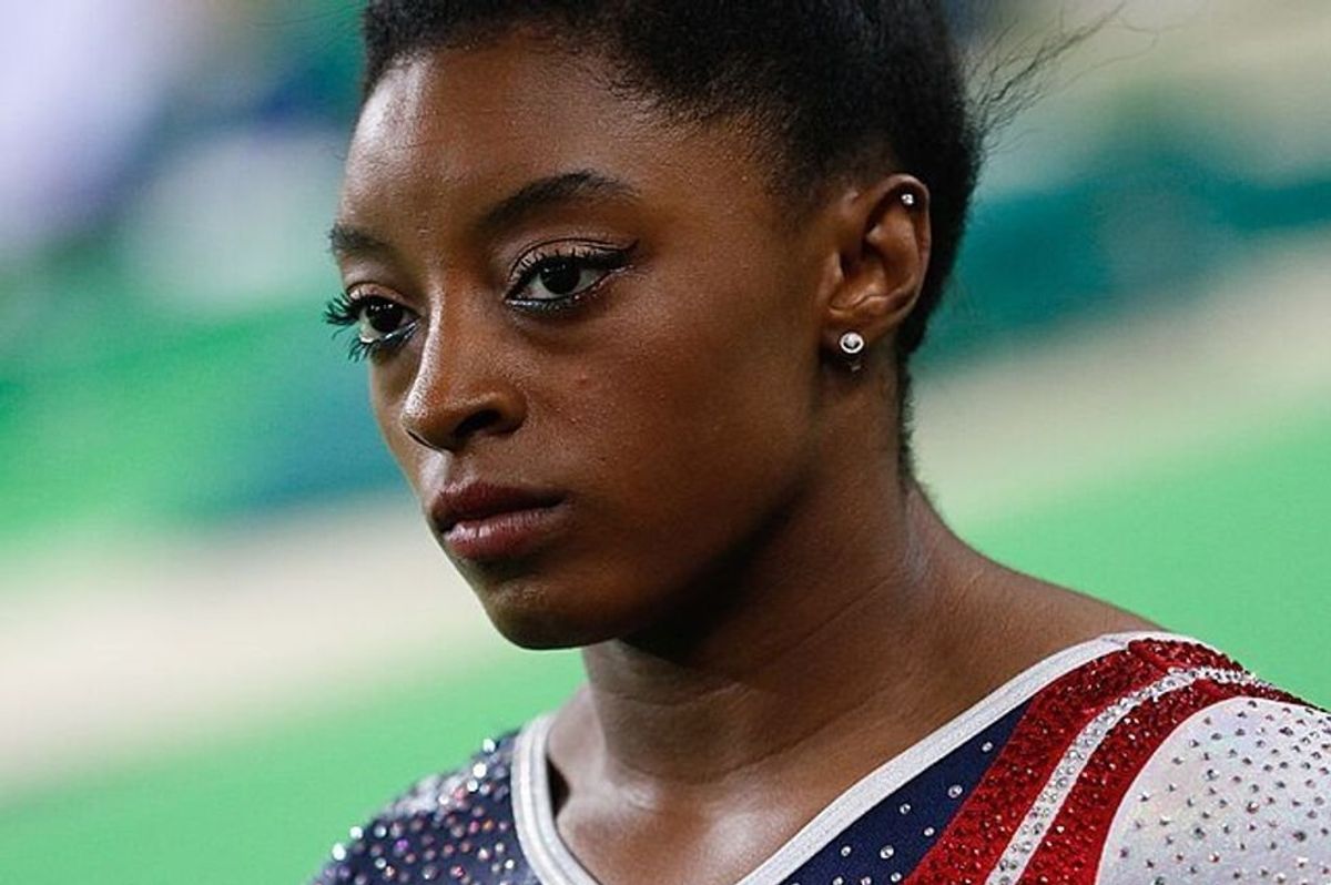 Simone Biles looking serious in competition