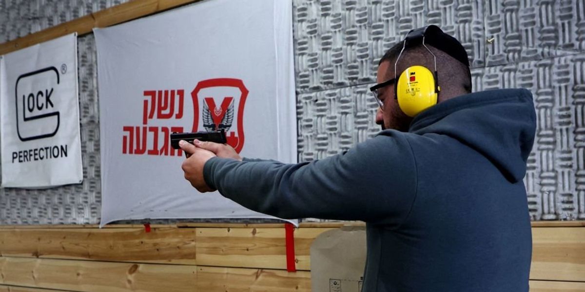 NextImg:Israel relaxes gun laws to increase number of armed and ready citizens in wake of terrorist attacks