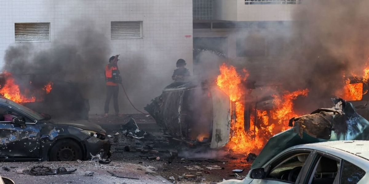 NextImg:Hamas says Iran backed attack on Israel; GOP candidates hammer Biden for releasing $6 billion in frozen funds to Iran