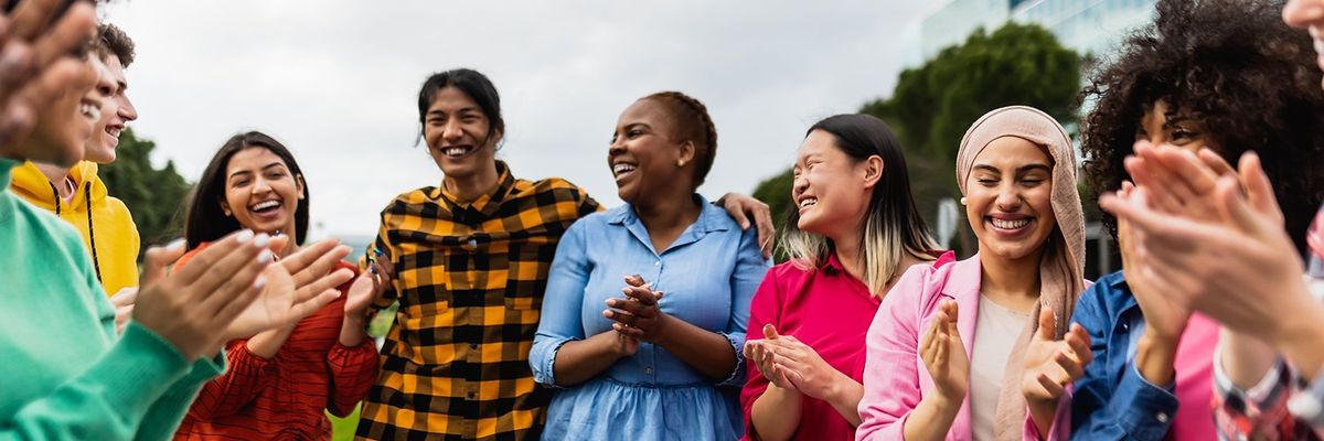 a community laughing together