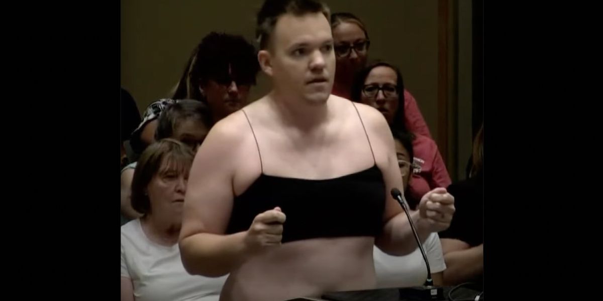 NextImg:Video: Father of 4 strips down to spaghetti-strap crop top, short shorts at school board meeting to protest more lenient dress code proposal