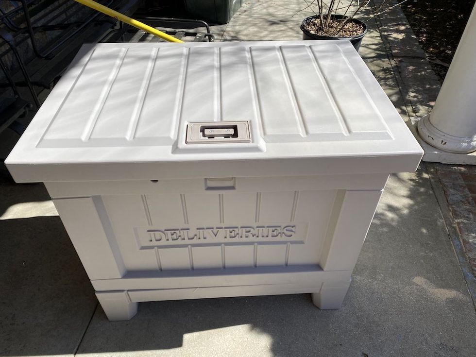 a photo of Yale Smart Deliverry Box on a porch