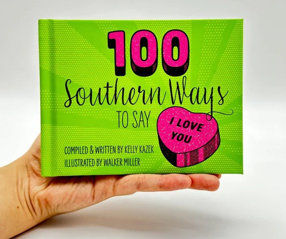 A hand holds a copy of "100 Southern Ways to Say I Love You."