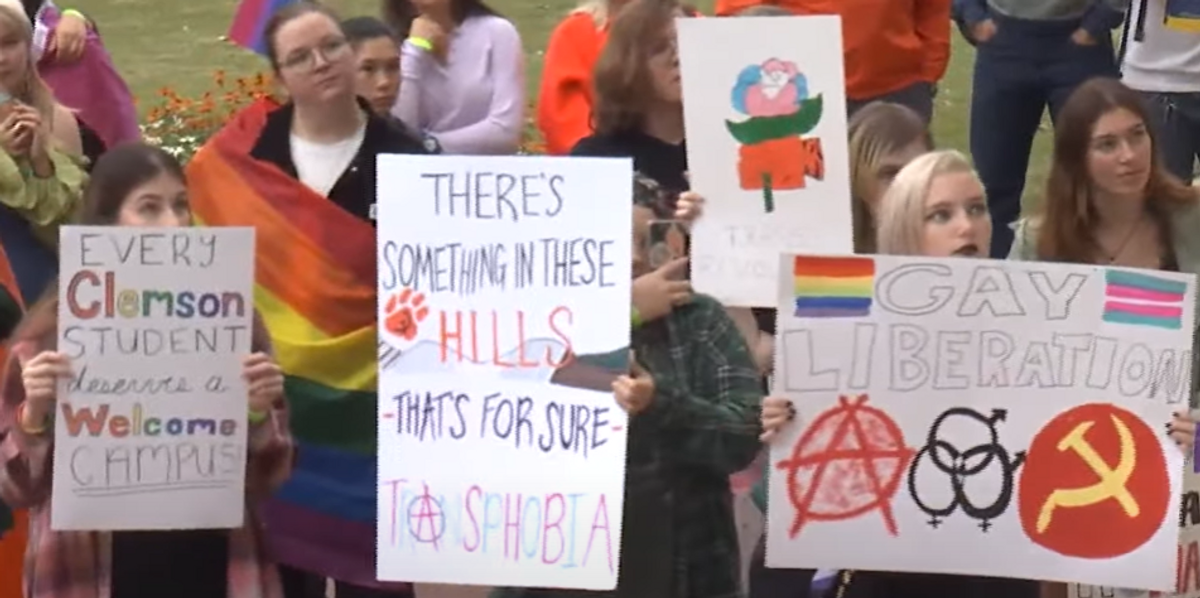 NextImg:LGBTQ students march against Clemson University removing tampons from men's bathrooms, demand 'repercussions' against Republican group