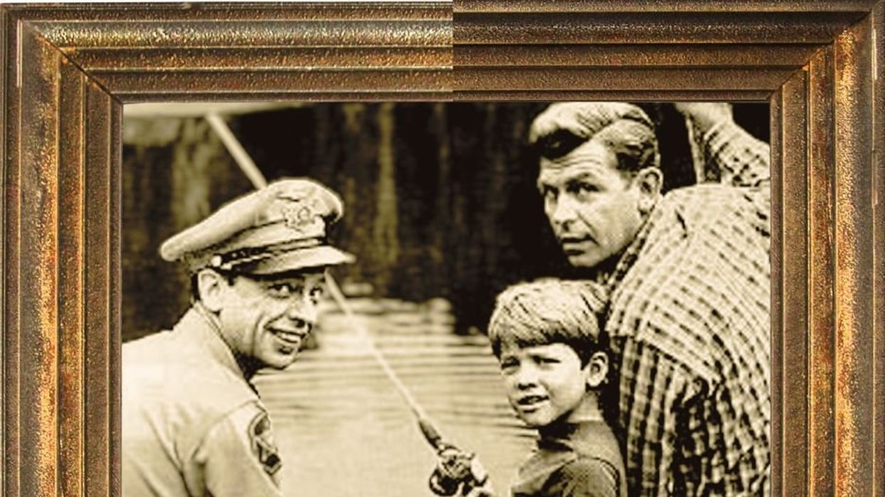 A framed image of characters from "The Andy Griffith Show": Sheriff Andy Taylor, Opie Taylor and Deputy Barney Fife